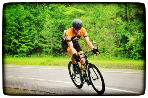 Fred racing around a corner at the Bristol Mountain Road Race 2019